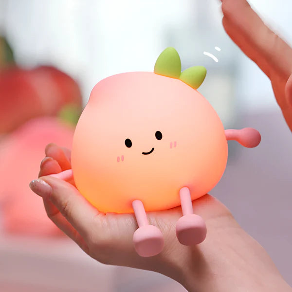 Lumini® Squishy Peach LED Night Light.