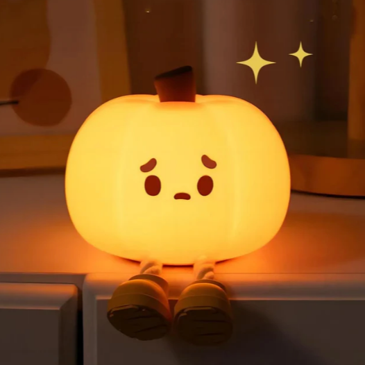 Lumini® Squishy Pumpkin LED Night Light.