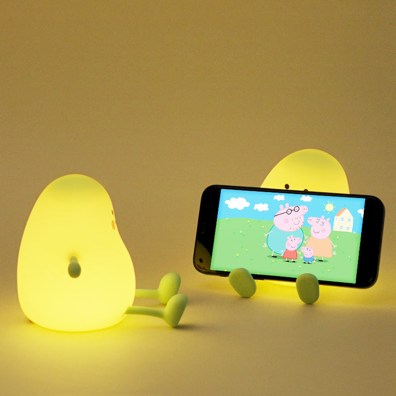 Lumini® Squishy Mango LED Night Light.