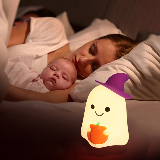 Lumini® Squishy Ghost Holding a Pumpkin LED Night Light.